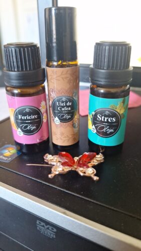 Click to view full screen Coffe Glow-Boost: Ulei de Cafea presat la rece ROLL-On photo review